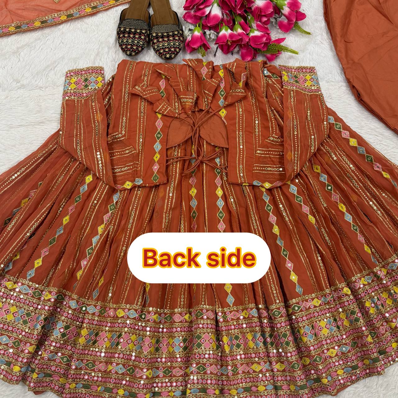 Radiant Rust Orange Flared Anarkali Suit Set Adorned with Multicolored Geometric Embroidery and Dazzling Mirror Work Detailing